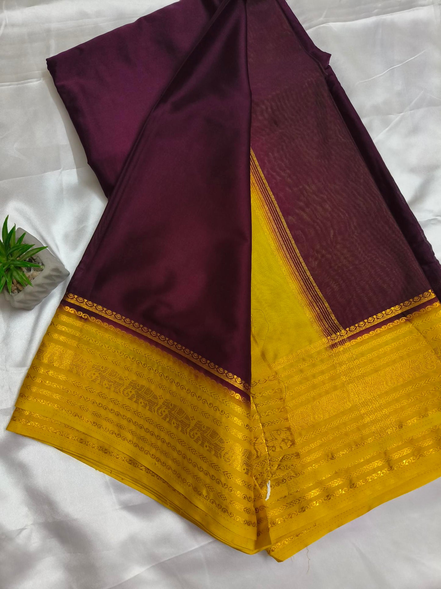 Elephant Border Maroon Crepe Silk Saree
