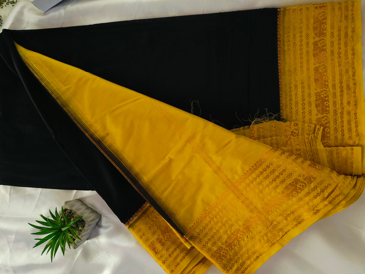 Elephant Border Black Crepe Silk Saree