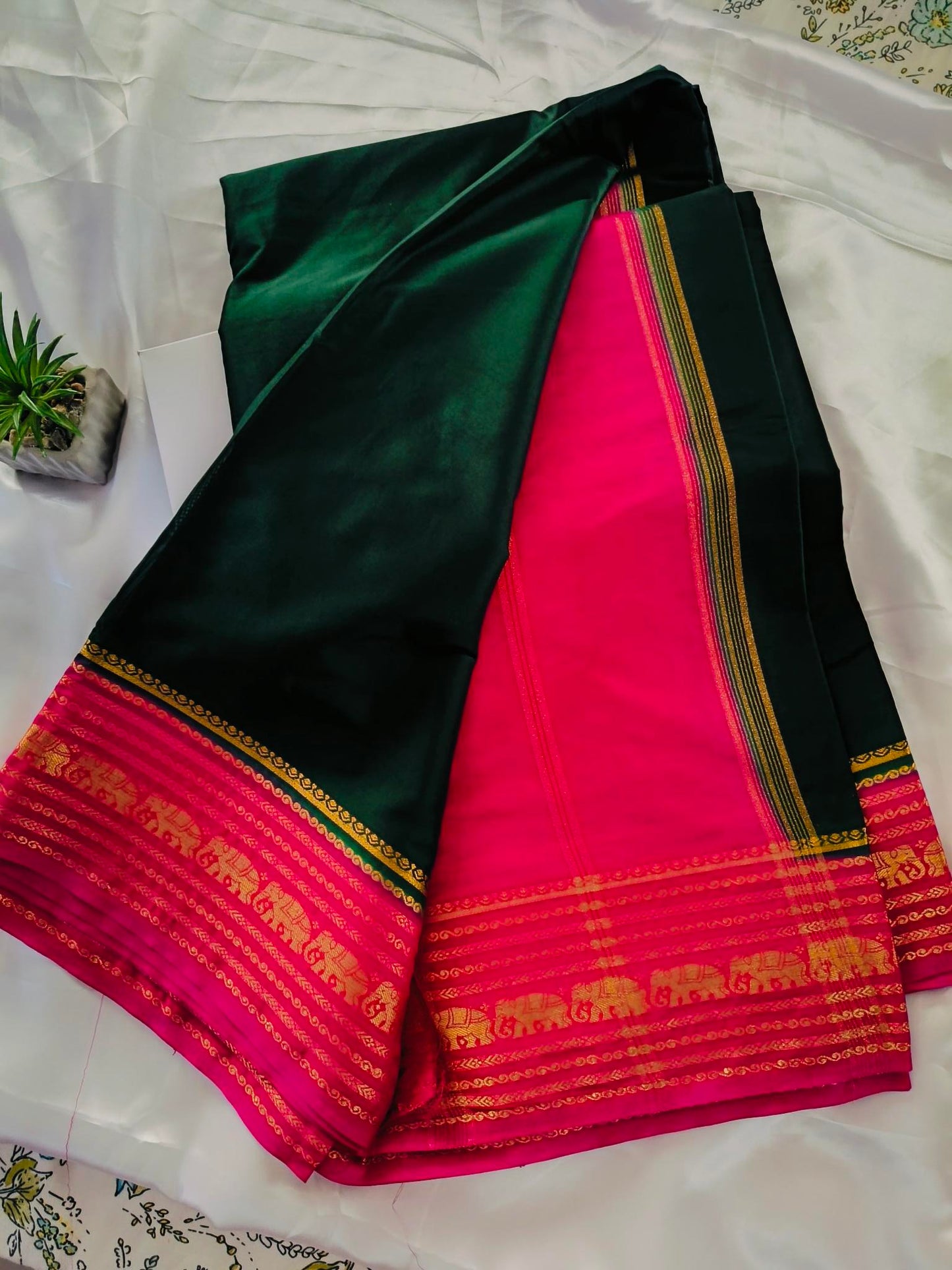 Elephant Border Green Crepe Silk Saree