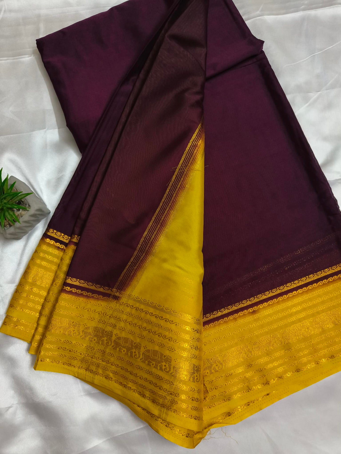 Elephant Border Maroon Crepe Silk Saree