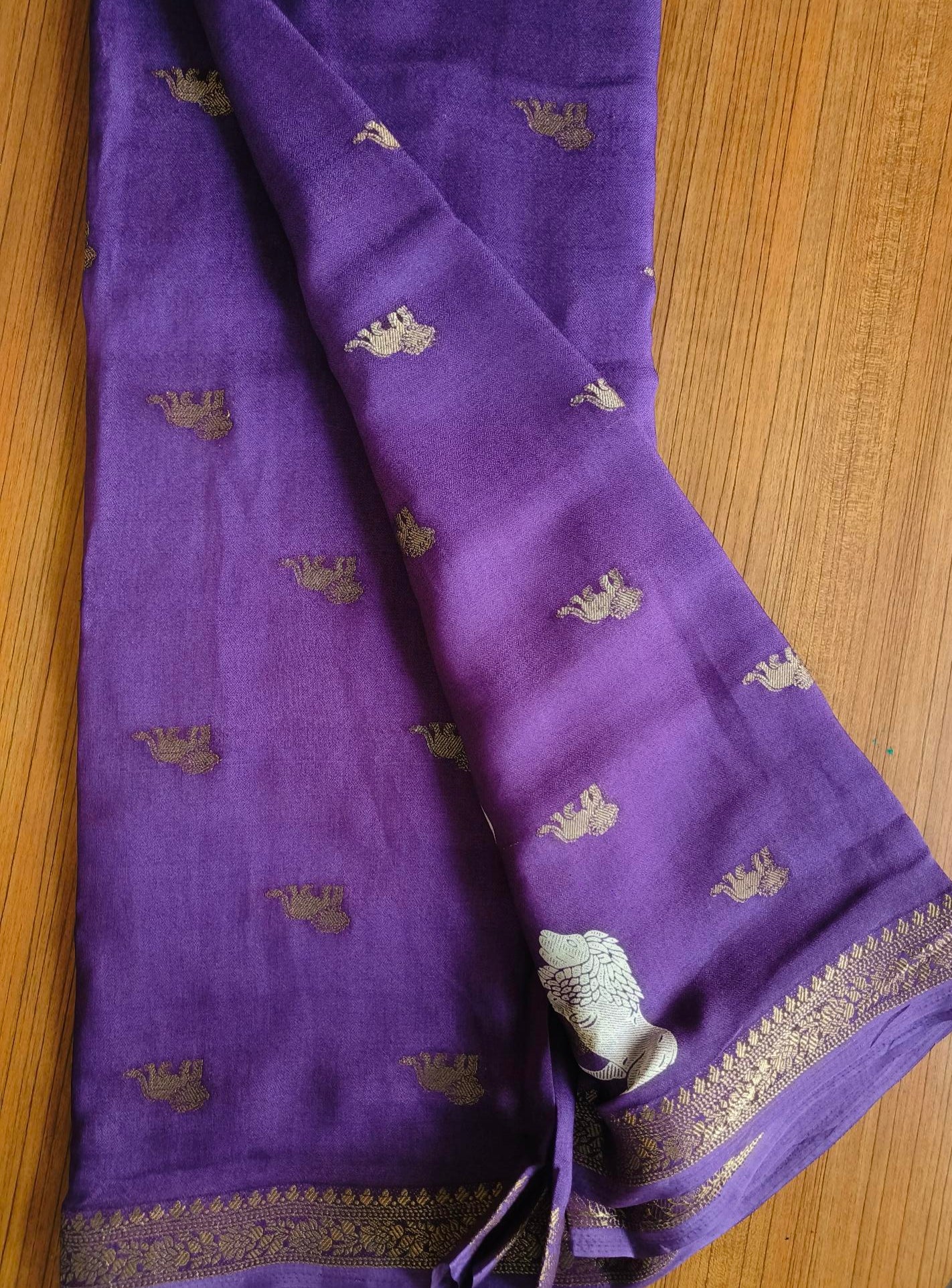 Small Border Animal Work Georgett Purple Saree