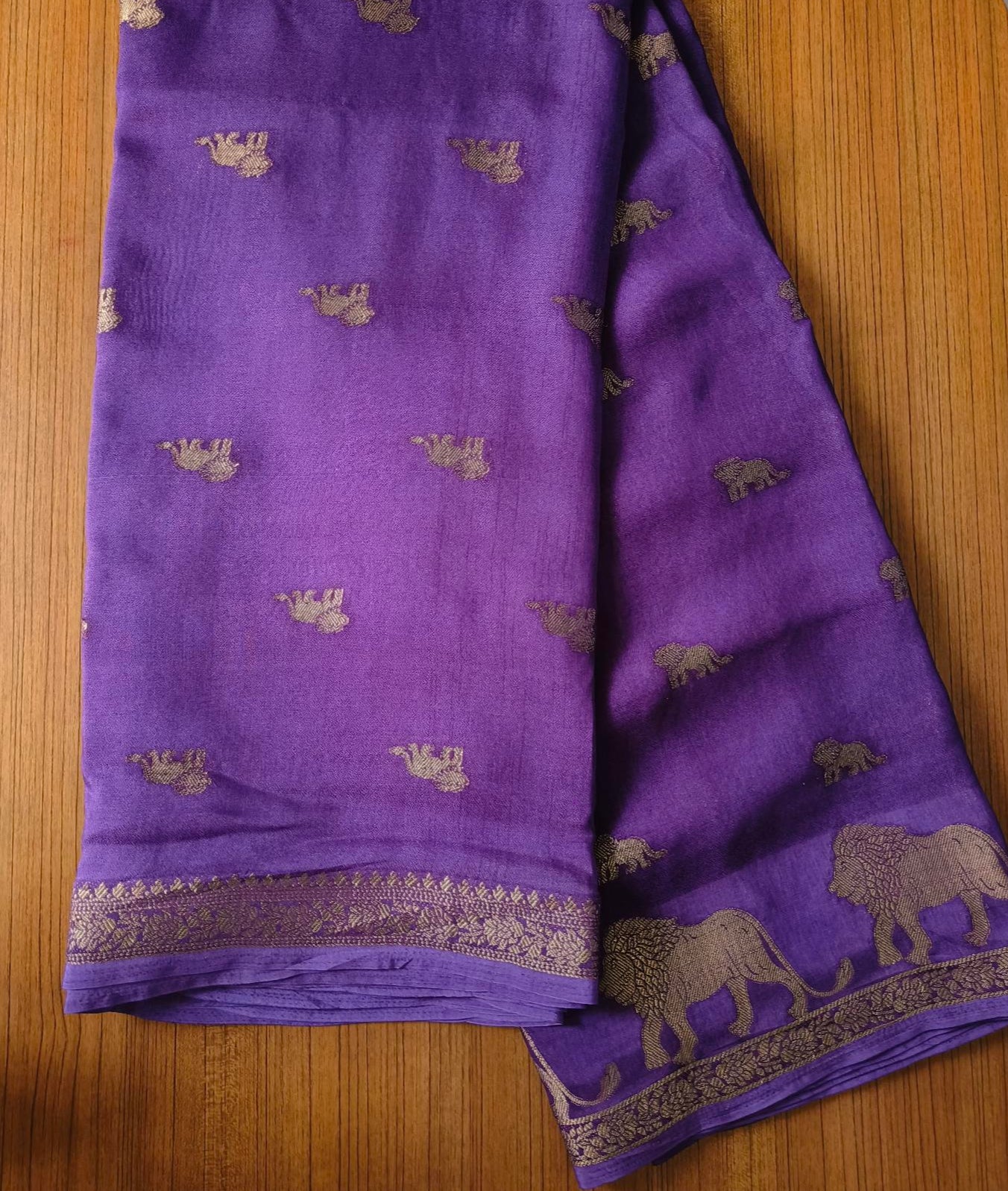 Small Border Animal Work Georgett Purple Saree